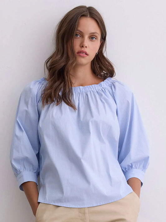 חולצת פסים תכלת־לבן עם שרוולי בלון